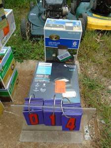 lot 14 image: Store return lighting fixtures. Some boxes have been opened. As shown.