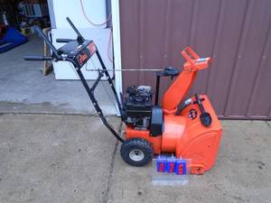 lot 26 image: Ariens 520 snow blower. Lightly used. Good condition. Tested & works. As shown.
