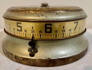 lot 22 image: Lux Tape Measure Clock from 1910