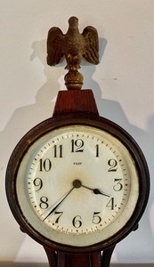 lot 31 image: Vintage New Haven 8-Day Banjo Clock with Secret Compartment