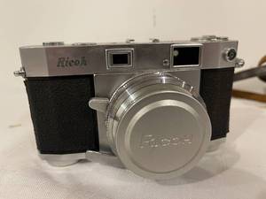 lot 395 image: Vintage Ricoh 500 35 MM Camera With Case