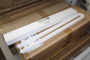 lot 552 image: Lot of (9) U-Shape LED Tube Bulbs (in box)