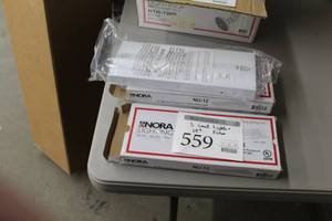 lot 559 image: Nora Lighting 12 Mini Inch Fluorescent Undercabinet Light Fixtures (in box)