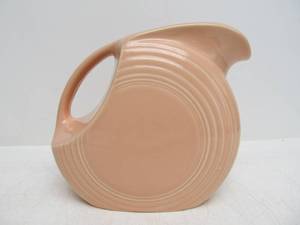 lot 102 image: Fiesta Ware Apricot Round Pitcher