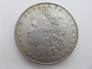 lot 244 image: 1886 Morgan Silver Dollar - Au