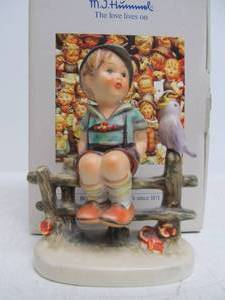 lot 107 image: Vintage Boy on Fence Hummel Figurine