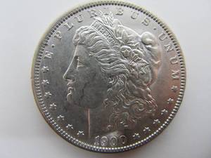 lot 195 image: 1900 Uncirculated O Morgan Silver Dollar