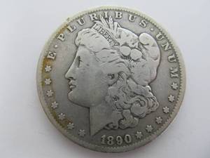 lot 197 image: 1890 CC Morgan Silver Dollar