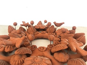lot 81 image: Floral & Bird Design Terra Cotta Wall Hanging
