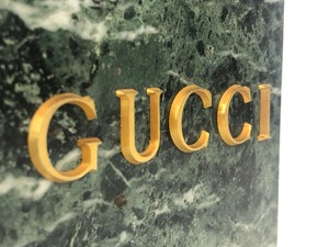 lot 84 image: Vintage Solid Marble GUCCI Store Display
