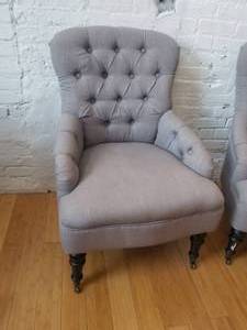 lot 33 image: Contemporary Tufted Armed Accent Chairs