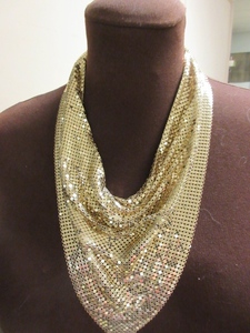 lot 819 image: WHITING & DAVIS, GOLD MESH BANDANA