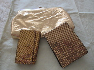 lot 831 image: GOLD MESH WALLET, GOLD MESH KEY CASE AND GOLD COSMETIC BAG