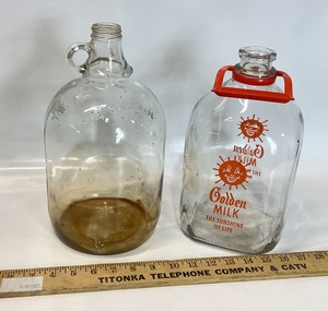 lot 36 image: Vintage Glass Gallons