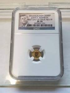 lot 01 image: 2014 BURUNDI JOHN F. KENNEDY GOLD 5000 FRANCS PF70 NGC FIRST DAY OF ISSUE