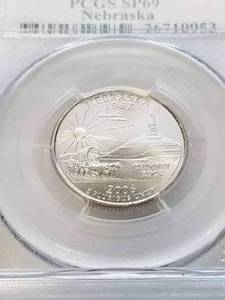 lot 12 image: 2006-P SATIN FINISH US STATE QUARTER NEBRASKA PCGS SP69