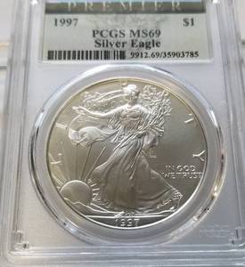 lot 46 image: 1997 AMERICAN SILVER EAGLE 1 TROY OZ. .999 FINE SILVER PCGS MS69