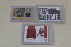 lot 38 image: 3 Football Jersey Patch Insert Cards - Kirk, McFarland, Brown