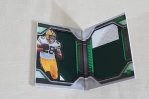 lot 29 image: 2020 Panini AJ Dillon Playbook Jumbo Patch Rookie Card - 2025