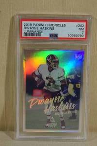 lot 21 image: 2019 Panini Chronicles Dwayne Haskins Luminance Rookie Card - PSA 7