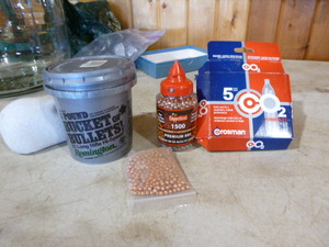 lot 98 image: Bucket of Bullets and BBs