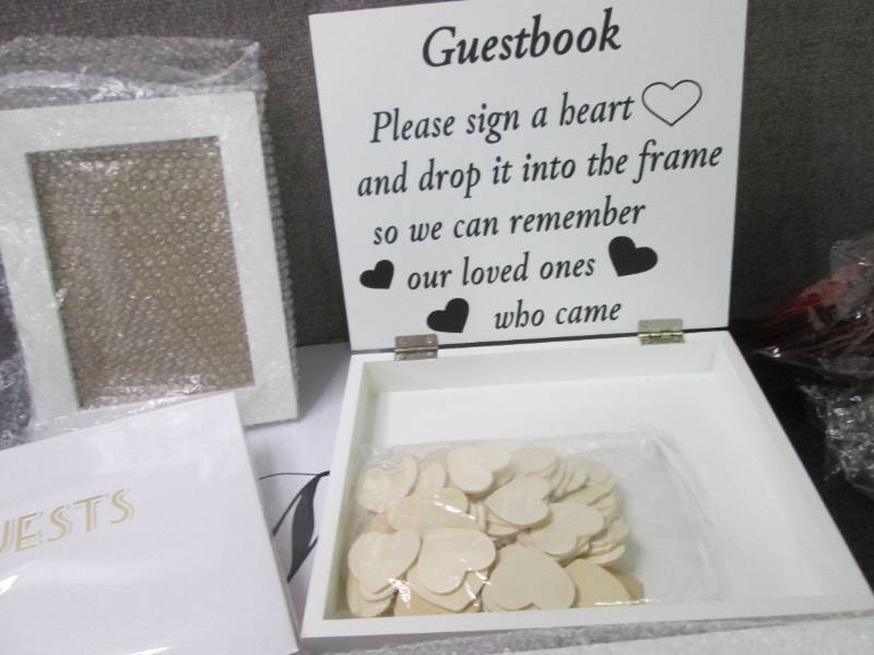 lot 42 image: Murello Guest Book Set...