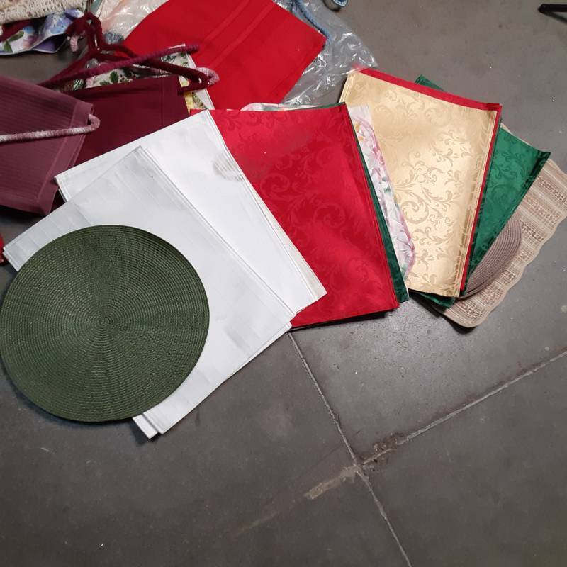 lot 0446 image: Covered Tote Full of Table Runners, Table Settings, and Other Great Material for Crafting
