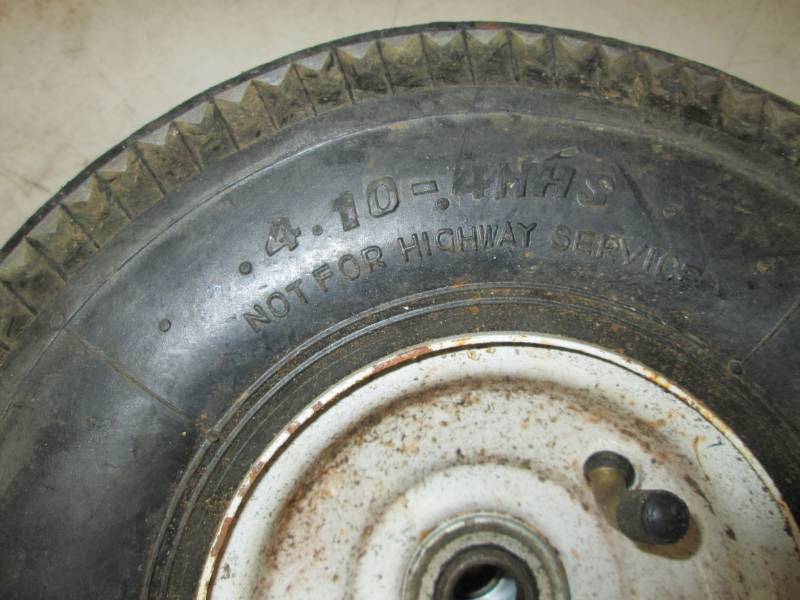 lot 39 image: small tire and rim  looks like its ...