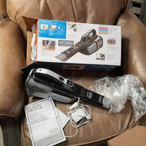lot 25 image: Black & Decker Cordless Vacuum See Photos