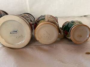 5 German beer steins.