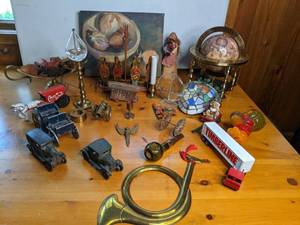 lot 33 image: Vintage Toys and Trinkets (Globe, Painting, Trucks, horn)