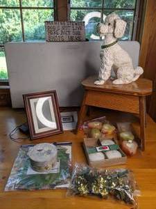 lot 34 image: Lovely Home Decorations (Dog Statue, Candles, Wall-art, Digital Frame, Wood Stand)