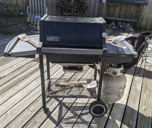 lot 84 image: Weber Gas Grill and Accessories