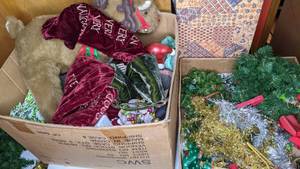 lot 330 image: Christmas Decor Lot - Garlands, Stockings, Santas, and more