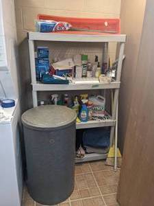 lot 265 image: Shelf with Cleaning Supplies and Barrel (56x36x19)