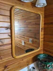 lot 255 image: Cute Bathroom Set Wall Mirror, Coordinating Bath Rugs, Towels and Wastebasket