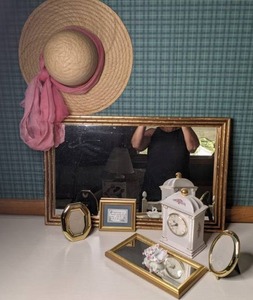 lot 102 image: Misc. Decorative Pieces Mirror, Picture Frames, 1993 PS Porcelain Clock, Straw Hat & More