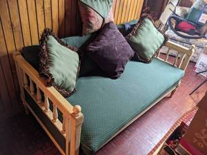 lot 120 image: Wooden SofaDaybed with CushionThrow Pillows