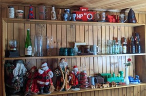 lot 298 image: Assortment of Bottles, Santa Figurines, Tea Set, Trains, Mugs and More