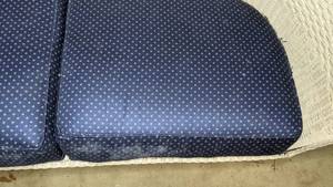 lot 220 image: Whimsical White Wicker Couch with Blue Cushions
