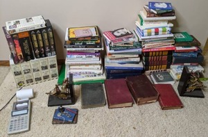 lot 178 image: Mixed Lot of Books (Elizabeth Goudge, Wentworth - Smith), VHS Tapes (Speed, Johnny Carson, Forest Gump), Bookends, Paperweight, & More