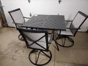 lot 4 image: Patio Table and 3 Swivel Chairs - Leg Damage