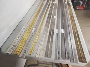 lot 14 image: 10 Assorted Long Hinges