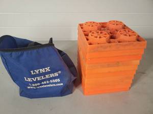 lot 56 image: Set of 10 Lynx Level RV  Camper Leveling Blocks