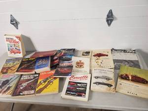 lot 106 image: Old Gun Digest Books, Corevette Service Manuals, Buick Ads, and More