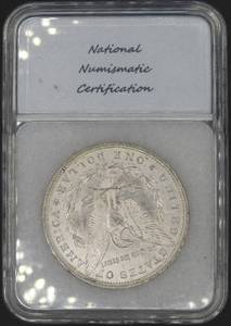 1884 O Morgan Silver Dollar - MS 64 - National Numismatic Certification