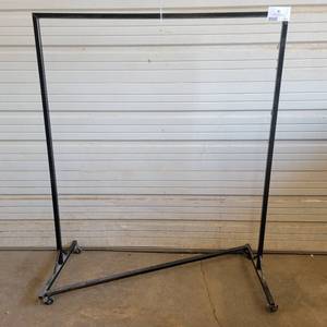 lot 312 image: Black 52.5 x 63.5 Industrial Steel Commercial Grade Garment Rack (Left)