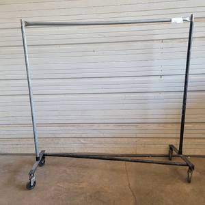 lot 314 image: Black 52.5 x 63.5 Industrial Steel Commercial Grade Garment Rack (Left)