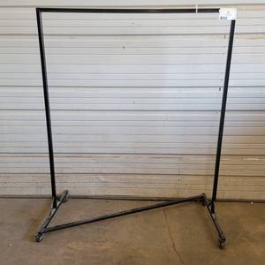 lot 320 image: Black 52.5 x 63.5 Industrial Steel Commercial Grade Garment Rack (Left)