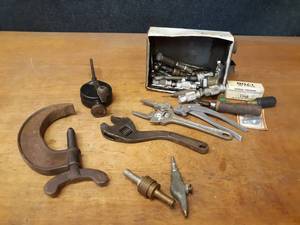 lot 730 image: Antique FORDSON Adjustable Wrench, Air Couplers and More
